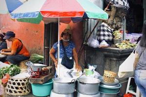 Badung Bali  January 13 2023 Photo of a seller waiting for someone to buy his wares at Pasar Kumbasari Badung