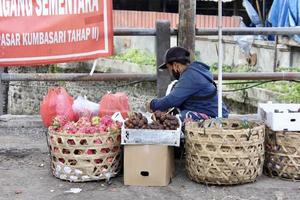 Badung Bali  January 13 2023 Photo of a seller waiting for someone to buy his wares at Pasar Kumbasari Badung