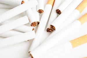 Cigarette, roll tobacco in paper with filter tube, No smoking concept. photo