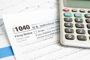 Tax form 1040 U.S. Individual Income Tax Return, business finance concept. photo