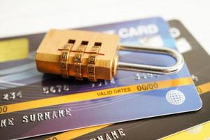 Credit card with password key lock, security finance business concept. photo