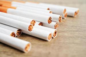 Cigarette, roll tobacco in paper with filter tube, No smoking concept. photo