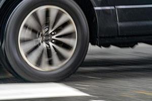 coach bus tire detail while raining in new york photo