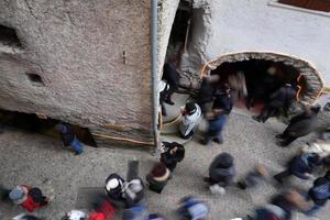 RANGO, ITALY - DECEMBER 8, 2017 - People at traditional christmas market photo