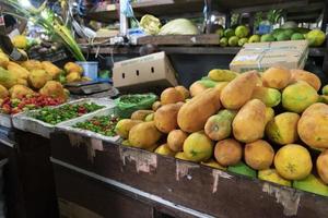 MALE, MALDIVES - FEBRUARY, 23 2019 - People buying at fruit and vegetables market photo