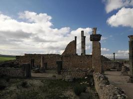 Volubilis Roman ruins in Morocco- Best-preserved Roman ruins located between the Imperial Cities of Fez and Meknes photo