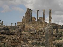 Volubilis Roman ruins in Morocco- Best-preserved Roman ruins located between the Imperial Cities of Fez and Meknes photo