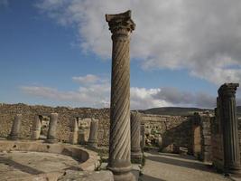 Volubilis Roman ruins in Morocco- Best-preserved Roman ruins located between the Imperial Cities of Fez and Meknes photo