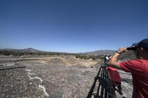 MEXICO CITY, MEXICO - JANUARY 30 2019 - Tourist at Teotihuacan pyramid mexico photo