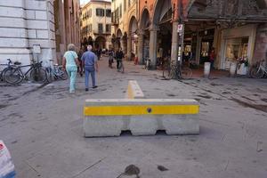 PISA, ITALY - SEPTEMBER 26 2017 -  Anti terrorism barrier in famous leaning tower town photo