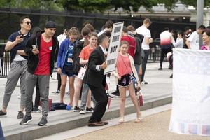 WASHINGTON DC, USA - APRIL 26 2019 - Demonstration  against Trump at White House photo