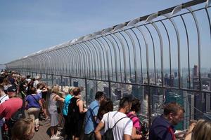 NEW YORK, USA - MAY 25 2018 - Empire state building crowded of tourists photo