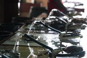 Male Maldives hand cleaning fish at the market photo