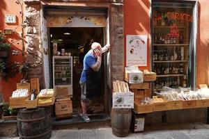 PORTOVENERE, ITALY - SEPTEMBER 24 2017 - Many Tourists in pictoresque italian village photo