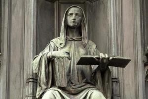 Prague charles bridge detail of statue photo