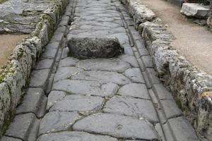 pompei ruins roman path street pedestrian walk photo