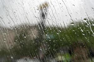 rain on car glass window in washington dc photo