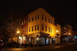 WASHINGTON DC, USA - MAY 16 2018 - Georgetown streets at night on rainy day photo