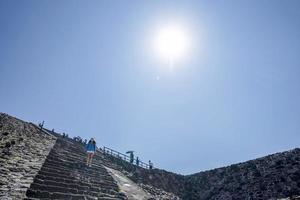 Tourist at Teotihuacan pyramid mexico photo