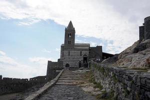 PORTOVENERE, ITALY - SEPTEMBER 24 2017 - Many Tourists in pictoresque italian village photo