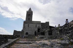 PORTOVENERE, ITALY - SEPTEMBER 24 2017 - Many Tourists in pictoresque italian village photo