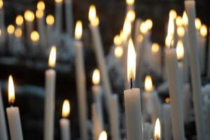 church votive candles white flames photo