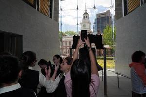 PHILADELPHIA, USA - MAY 23 2018 - Visitors at Liberty Bell photo