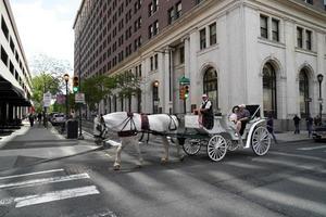 PHILADELPHIA, USA - MAY 23 2018 - historical horse wagon and Visitors at Liberty hall place photo