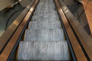 Metro escalator subway with no people photo