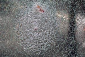 broken bulletproof glass close up photo