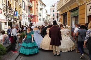 GENOA, ITALY - MAY 5 2018 - 19 century dress parade for Euroflora Exhibit in the unique scenario of the Nervi photo