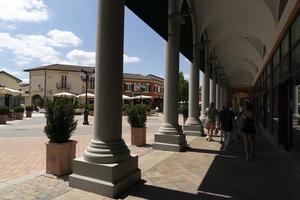 SERRAVALLE SCRIVIA, ITALY - JULY 12 2020 - Sale season in designer outlet is starting after covid lockdown photo