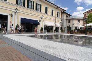 SERRAVALLE SCRIVIA, ITALY - JULY 12 2020 - Sale season in designer outlet is starting after covid lockdown photo