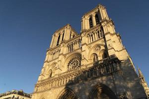 Notre dame Paris cathedral on lue sky photo