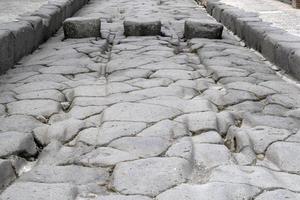 pompei ruins roman path street pedestrian walk photo