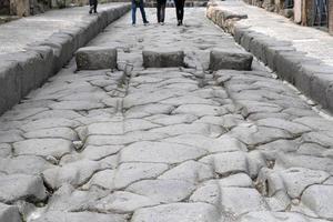 pompei ruins roman path street pedestrian walk photo