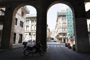 GENOA, ITALY - APRIL 5 2020 - Downtown streets are desert due to coronavirus covid quarentine photo