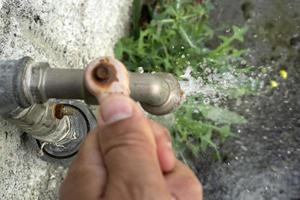 open outdoor water tap close up photo