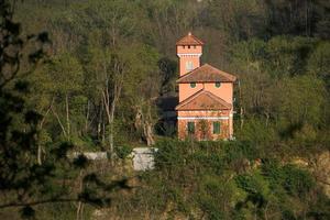 red castle in countryside photo