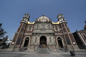 MEXICO CITY, MEXICO - JANUARY 30 2019 - Pilgrims at Guadalupe Cathedral photo