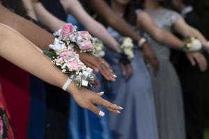 Prom young teenager boys and girls hands photo