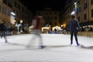 CHIAVARI, ITALY - DECEMBER 23, 2018 - Historical medieval town ice skating is open photo