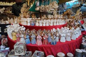 TRENTO, ITALY - DECEMBER 9, 2017 - People at traditional christmas market photo