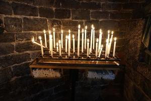 church votive candles white flames photo