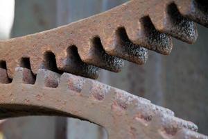 old rusted iron gear close up detail photo