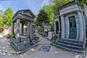 PARIS, FRANCE - MAY 2, 2016 old graves in Pere-Lachaise cemetery photo