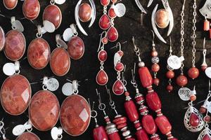 Coral necklage earrings jewelry on display stand photo