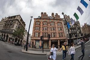 LONDON, ENGLAND - JULY 16 2017 - Tourists and locals in Piccadilly Circus congested town traffic photo