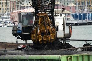 Harbor port dredge working on sea photo