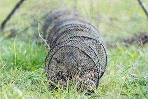 handmade old fishing net outside fisherman house photo